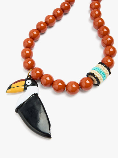 Short Necklace Of Beads With Bird Pendant