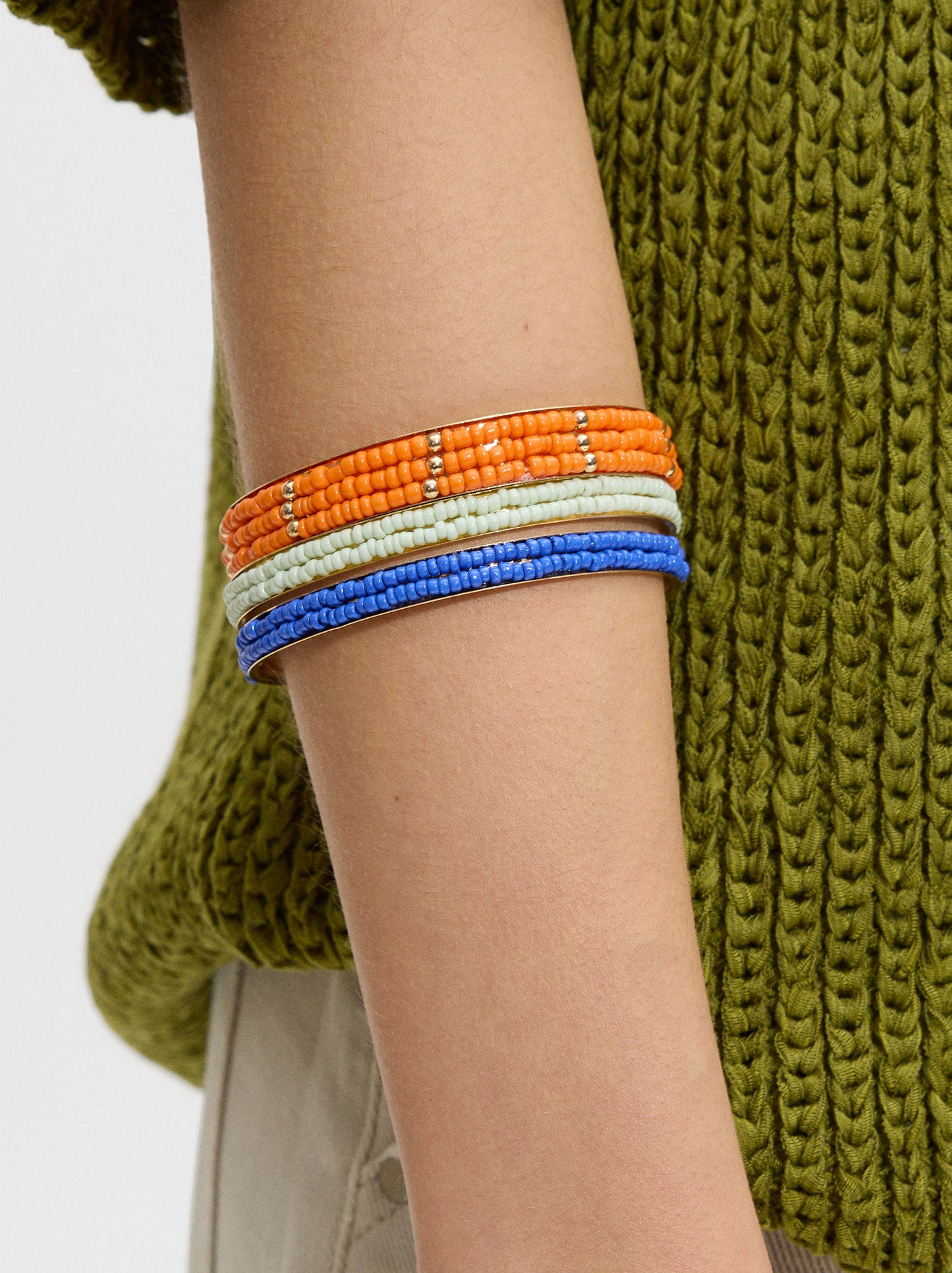 Set Of Rigid Bracelets With Glass Beads