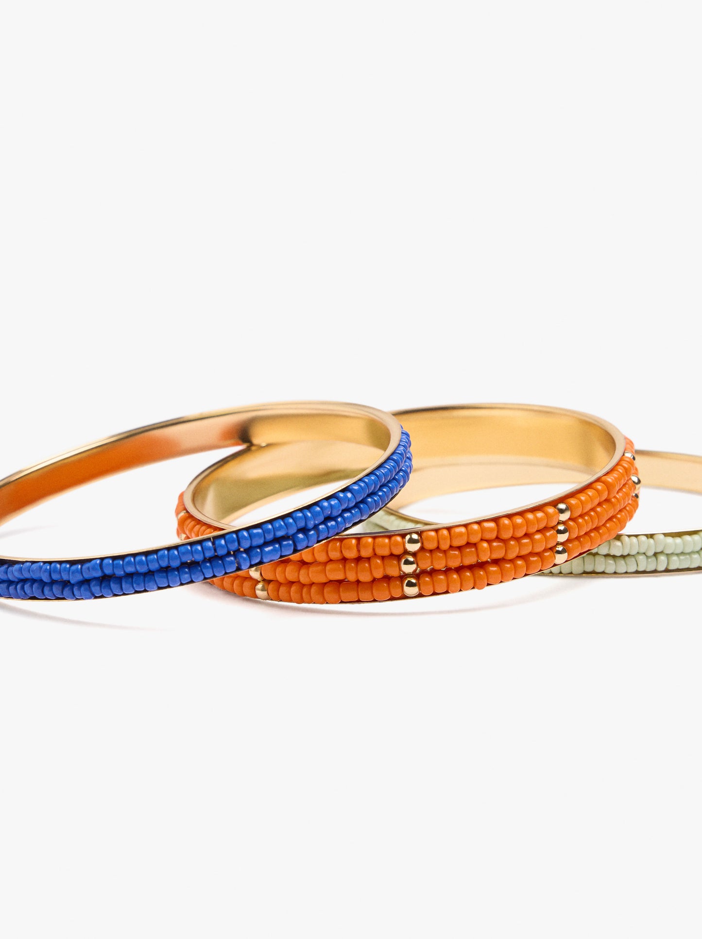 Set Of Rigid Bracelets With Glass Beads