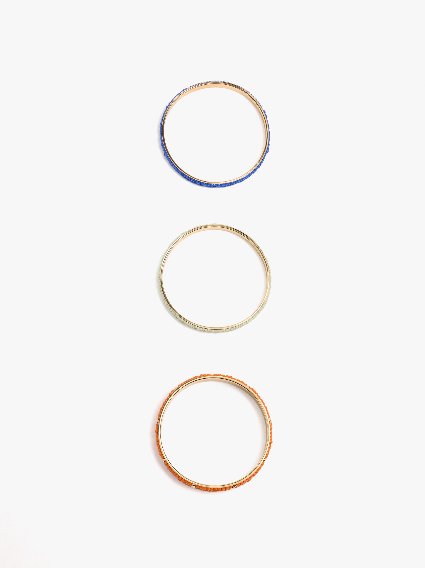 Set Of Rigid Bracelets With Glass Beads