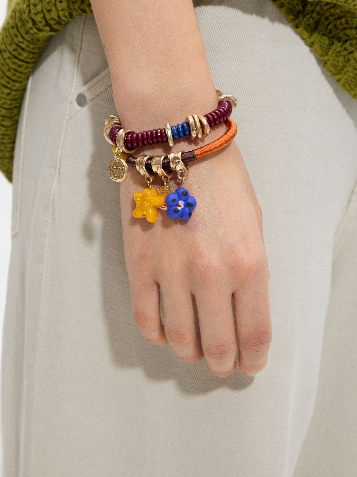Set Of Multicolor Bracelets With Pendants