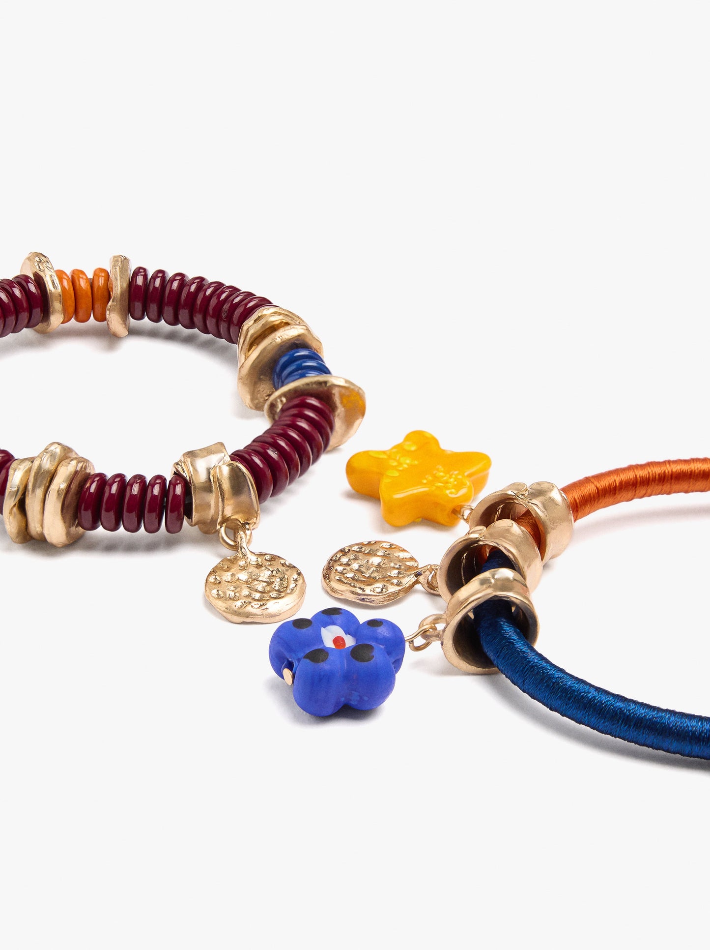 Set Of Multicolor Bracelets With Pendants