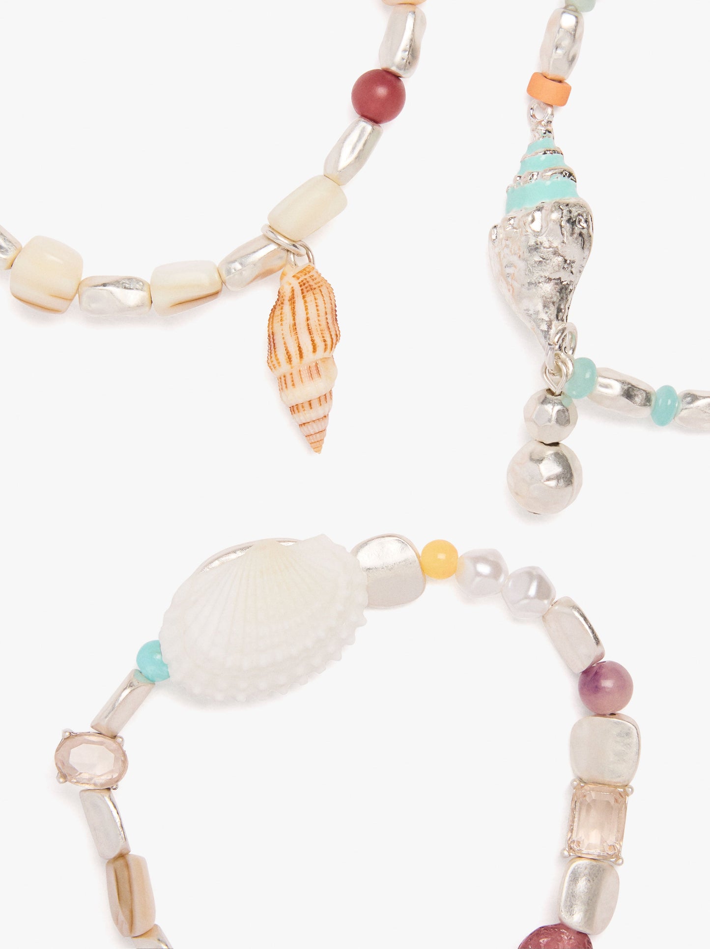 Set Of Stone And Shell Bracelets