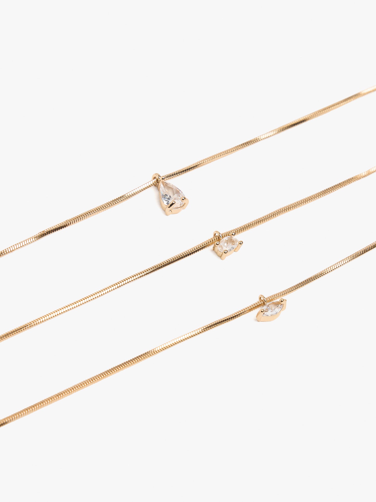 Set Of Bracelets With Zirconia Pendants