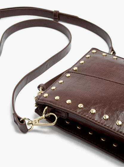 Elongated Crossbody Bag With Cracked Effect And Studs