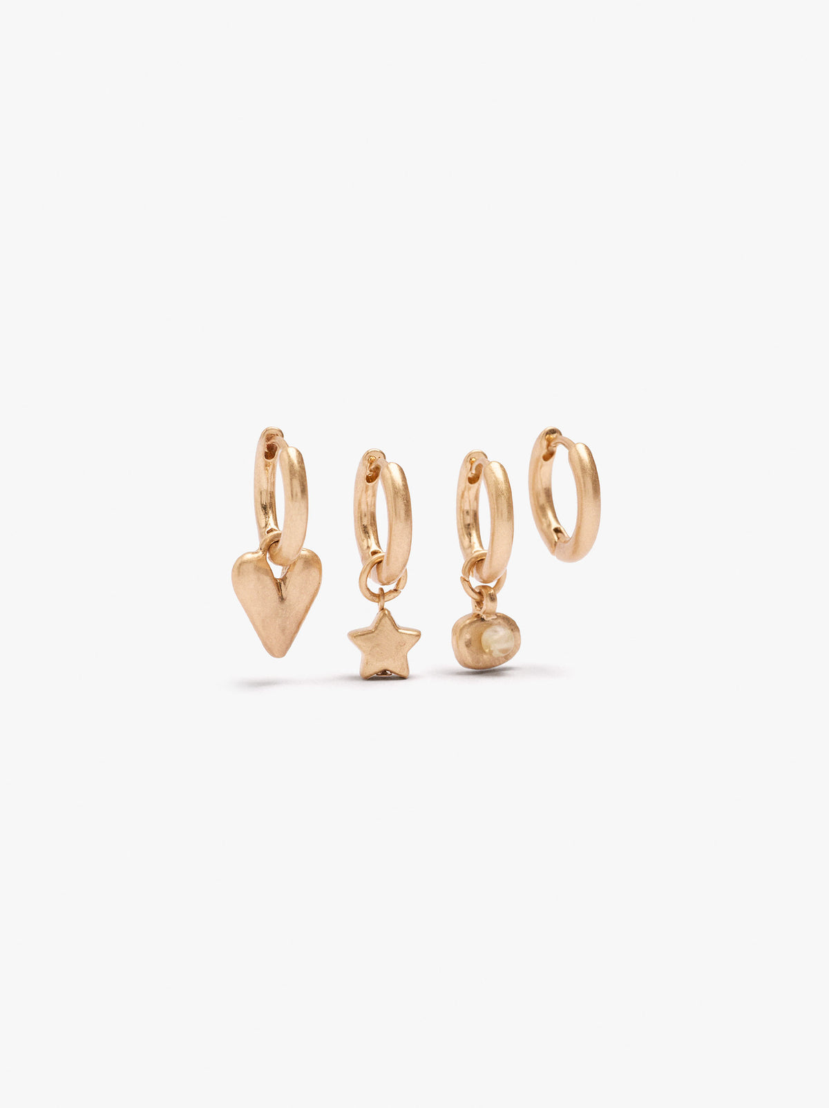 Set Of Hoop Earrings With Assorted Pendants