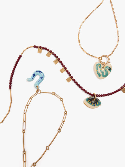 Set Of Three Necklaces With Ceramic Pendants