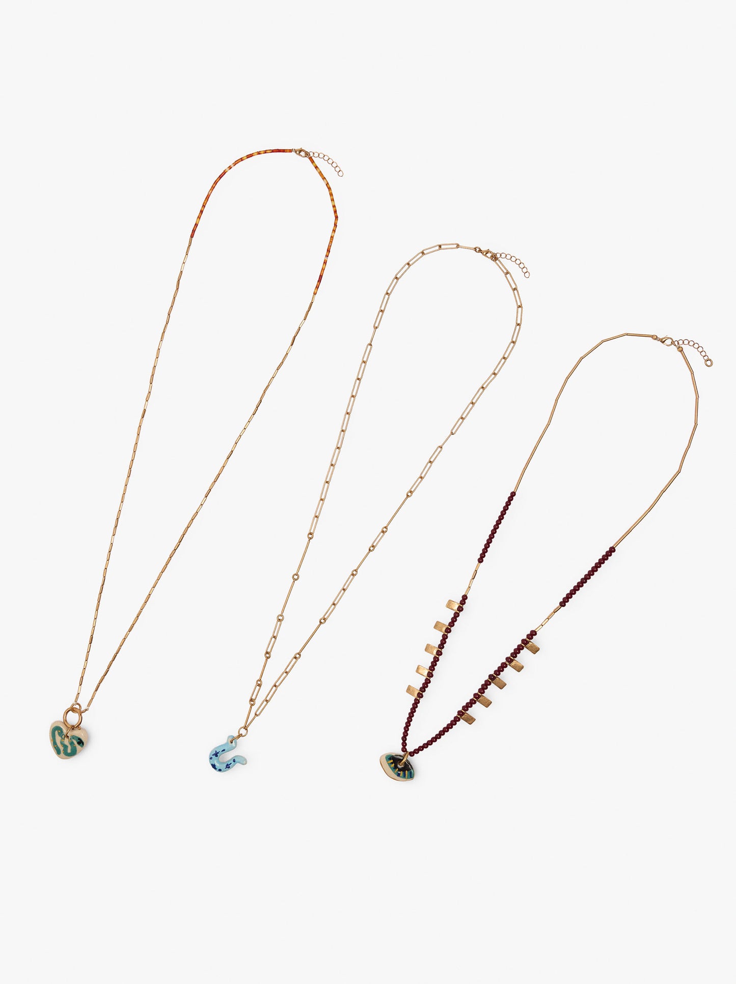 Set Of Three Necklaces With Ceramic Pendants