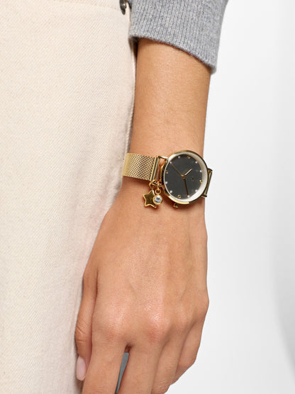 Round Watch With A Steel Mesh Strap And Charm
