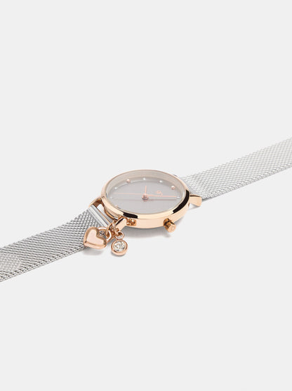 Round Watch With A Steel Mesh Strap And Charm