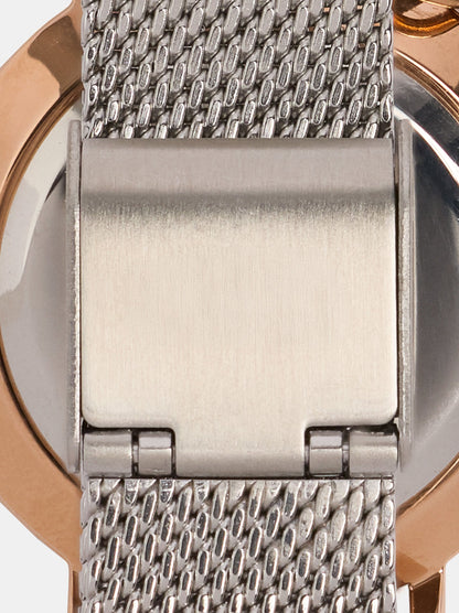 Round Watch With A Steel Mesh Strap And Charm