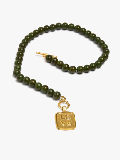 Necklace With Glass Beads And Love Pendant