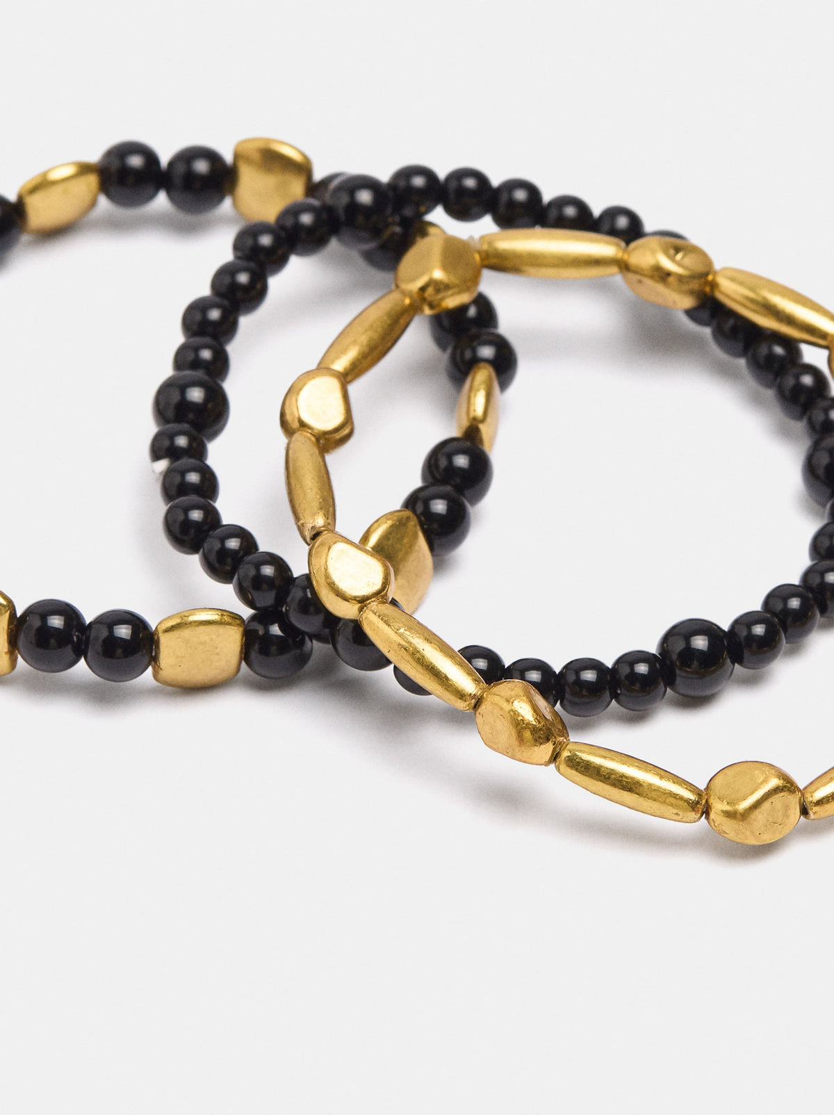 Set Of Elasticated Bead Bracelets