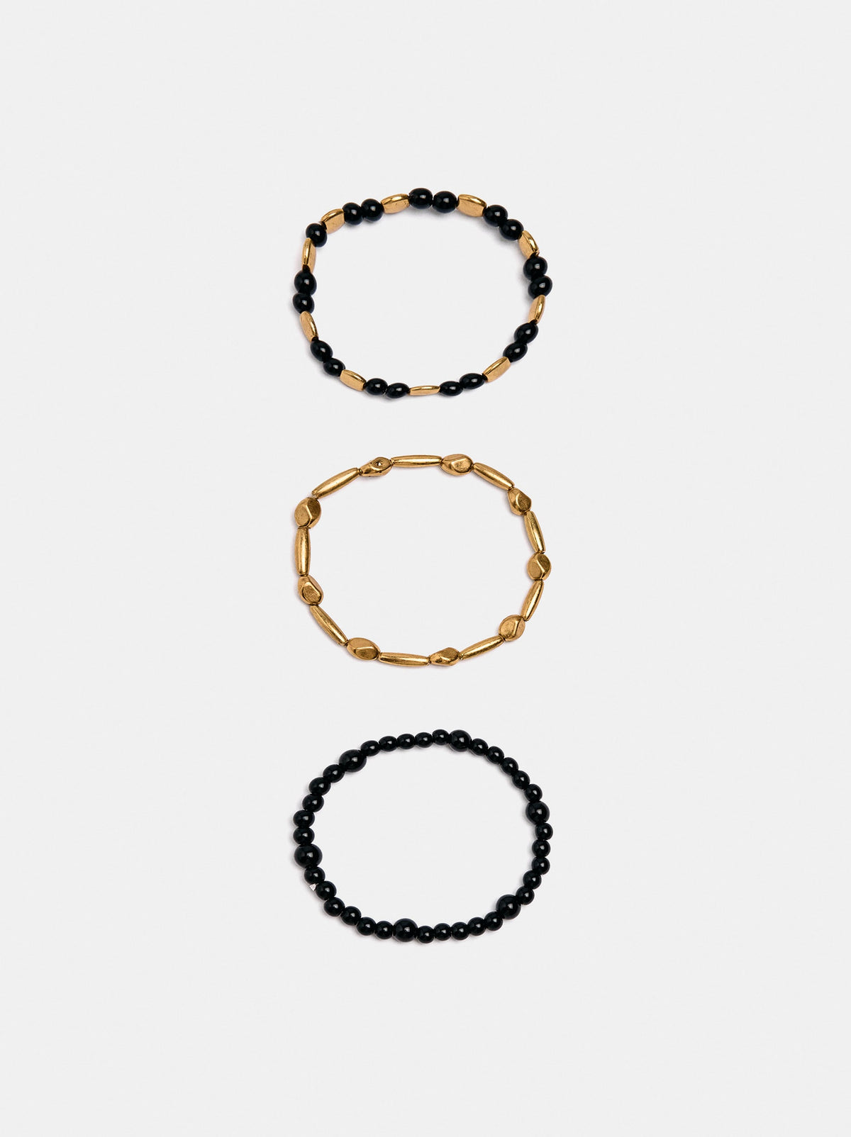 Set Of Elasticated Bead Bracelets