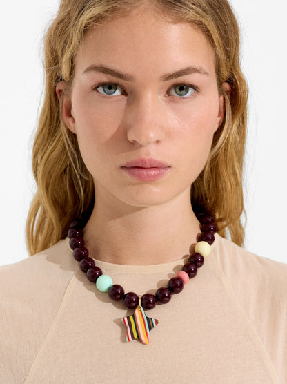 Beaded Necklace With A Striped Star Pendant