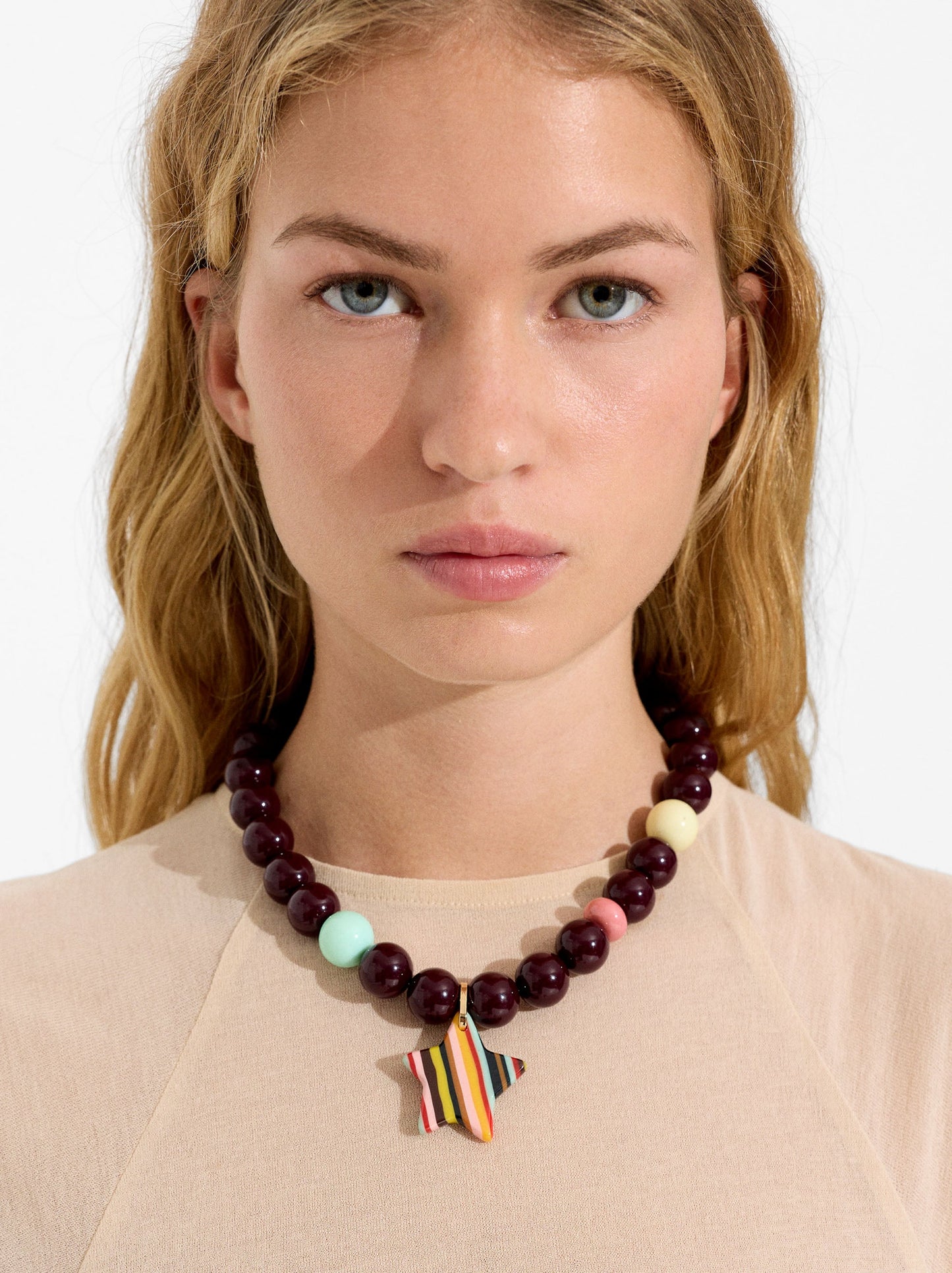 Beaded Necklace With A Striped Star Pendant
