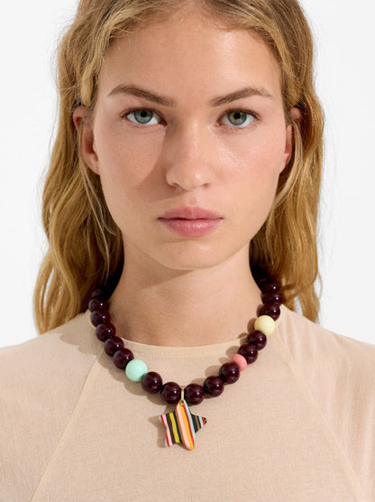Beaded Necklace With A Striped Star Pendant