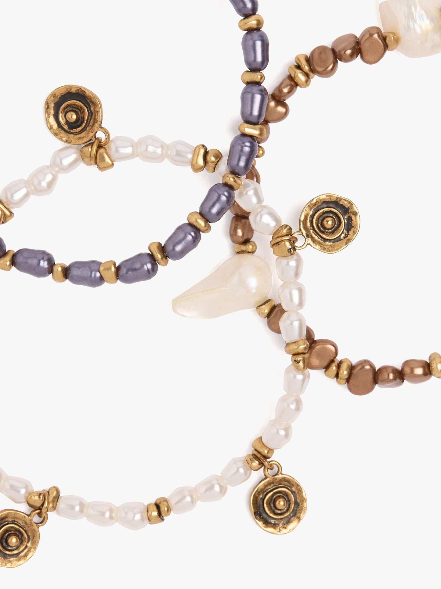 Set Of Elastic Bracelets With Pearls