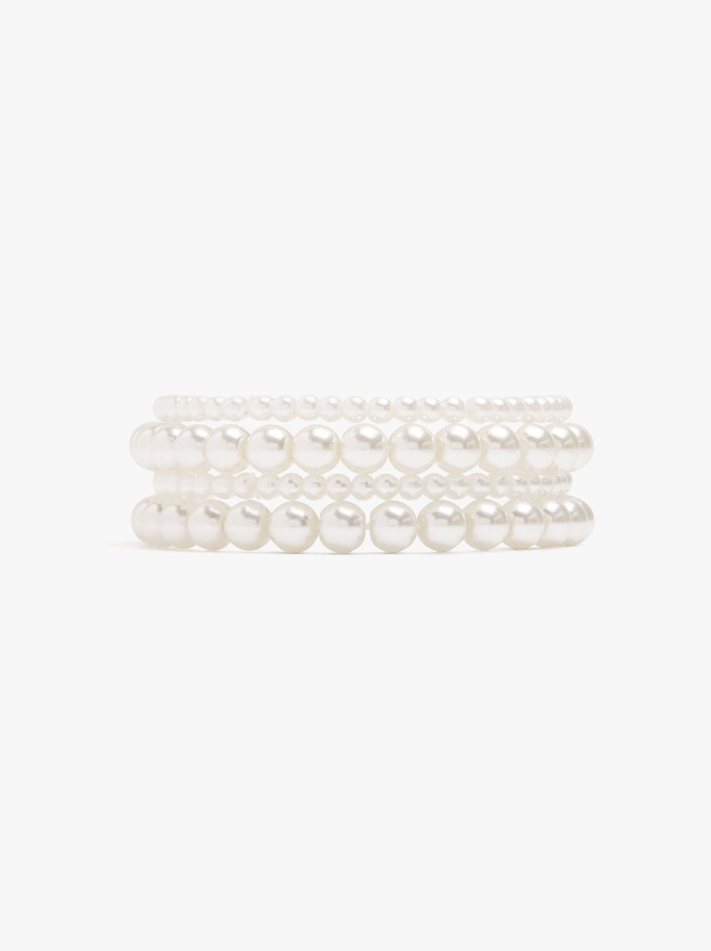 Set Of Elastic Bracelets With Pearls