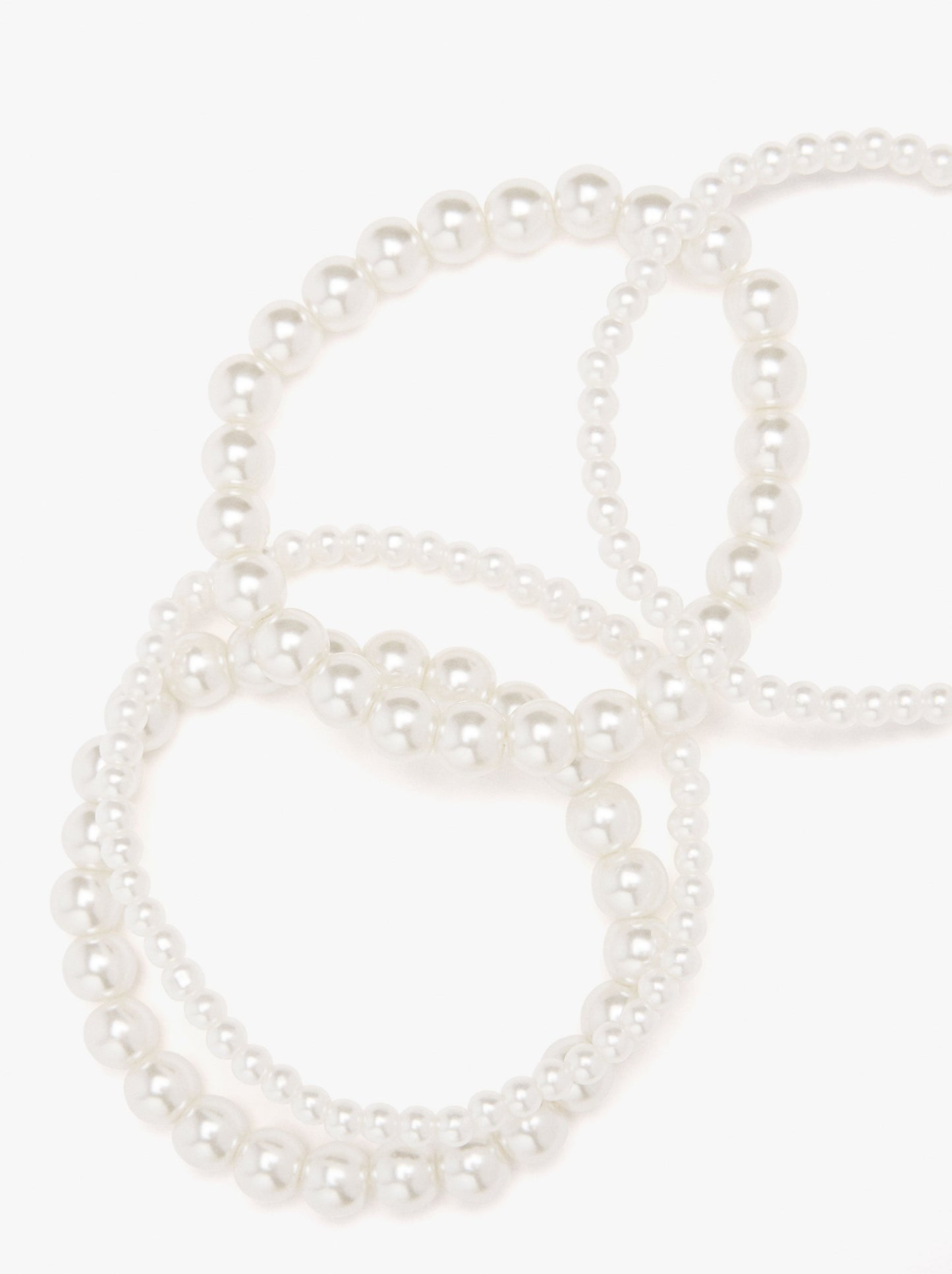 Set Of Elastic Bracelets With Pearls