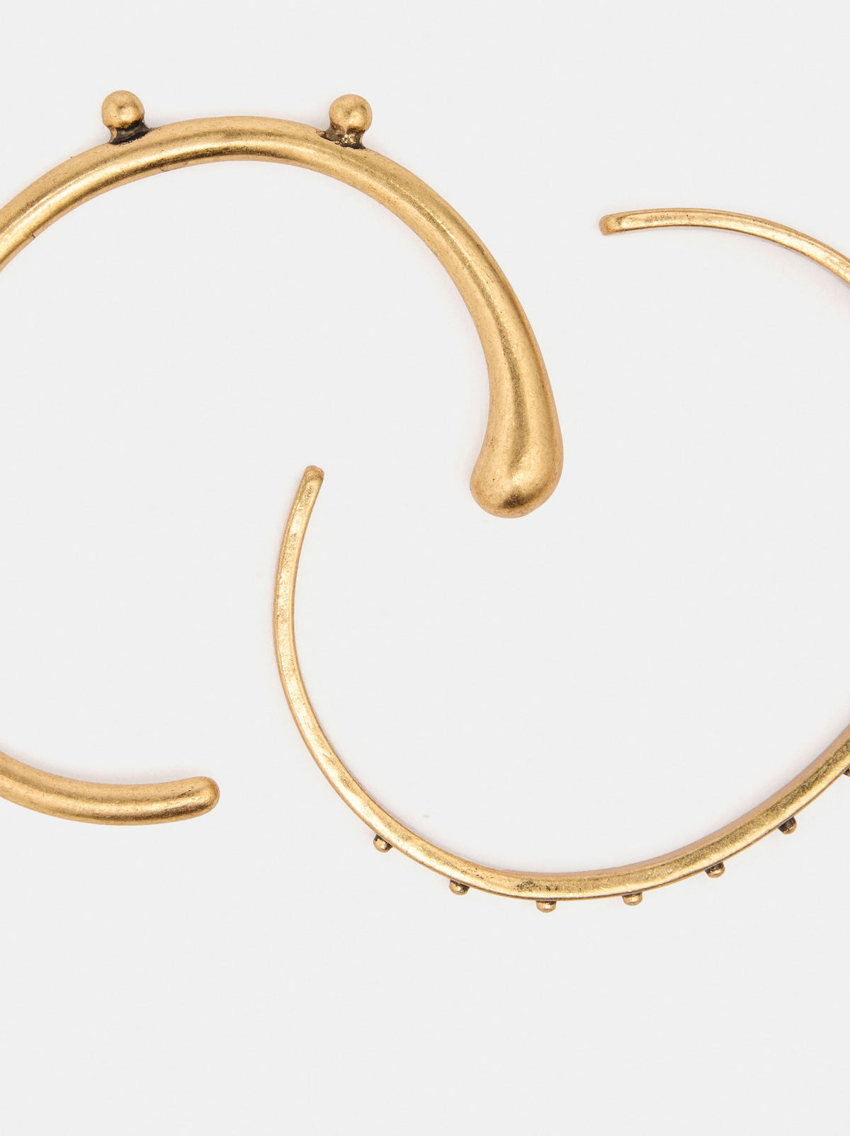 Set Of Rigid Bracelets With Beads