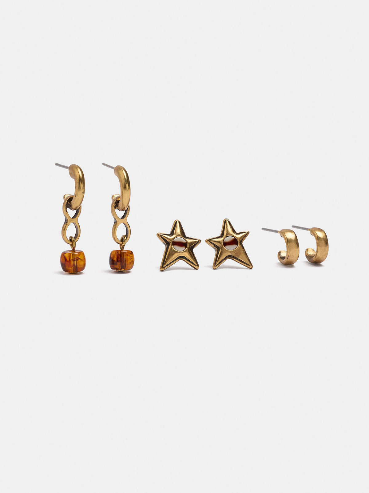 Set Of Bicolor Earrings With Details