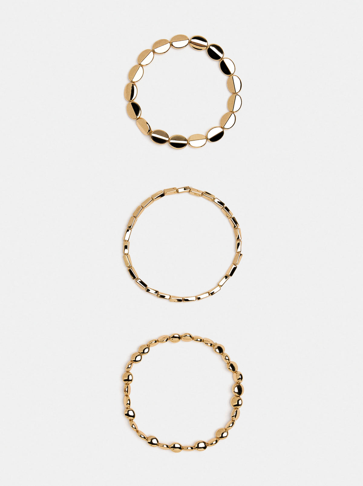 Set Of Elastic Bracelets With Rounded Beads
