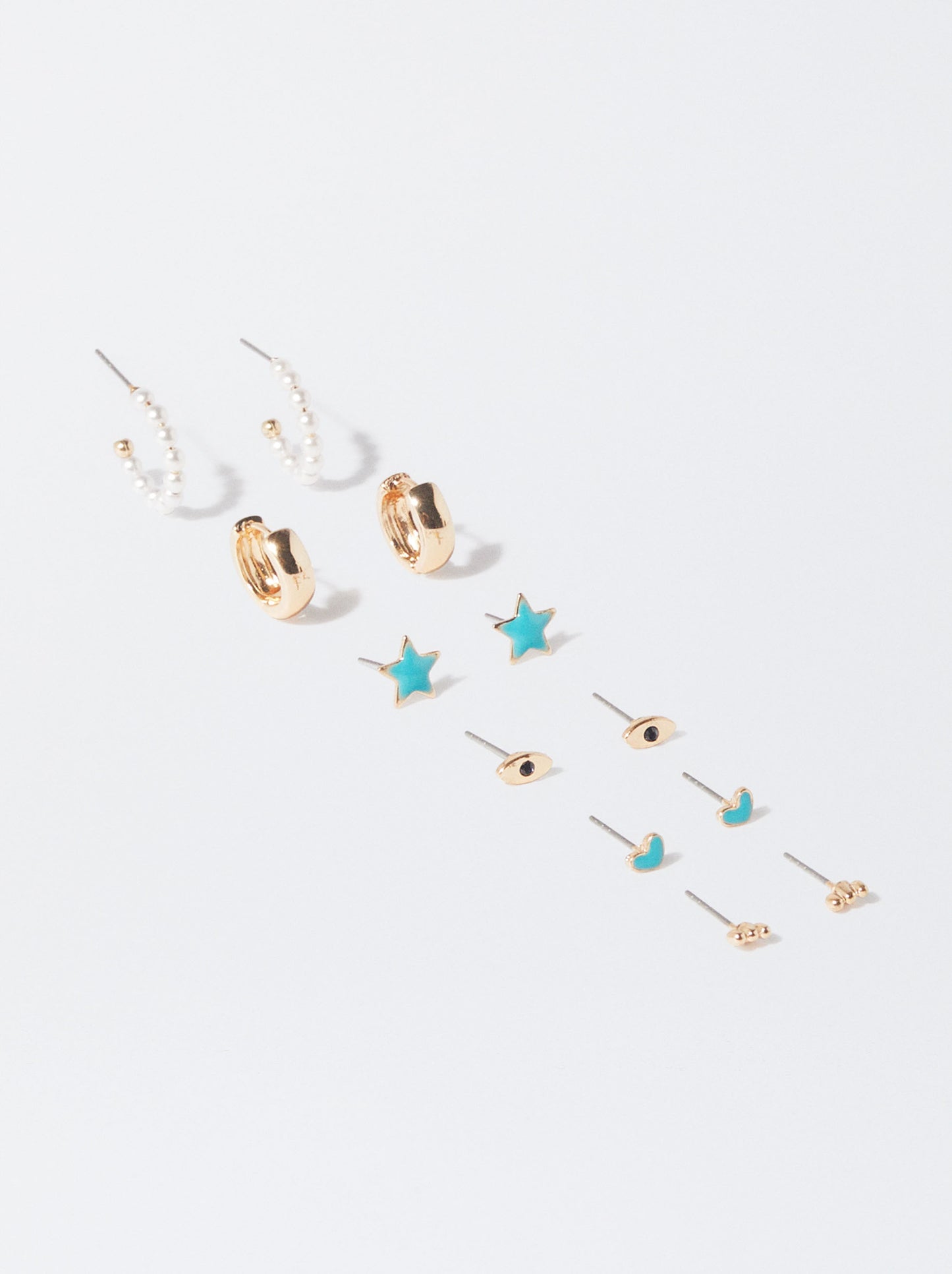 Set Of Earrings With Star And Pearls